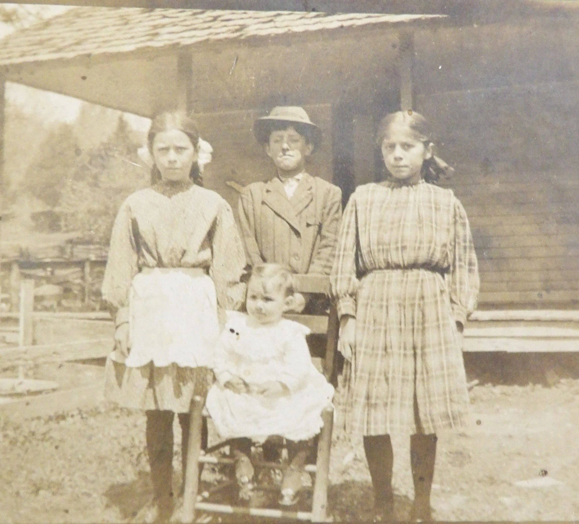 Vintage sepia-toned early 1900s family portrait